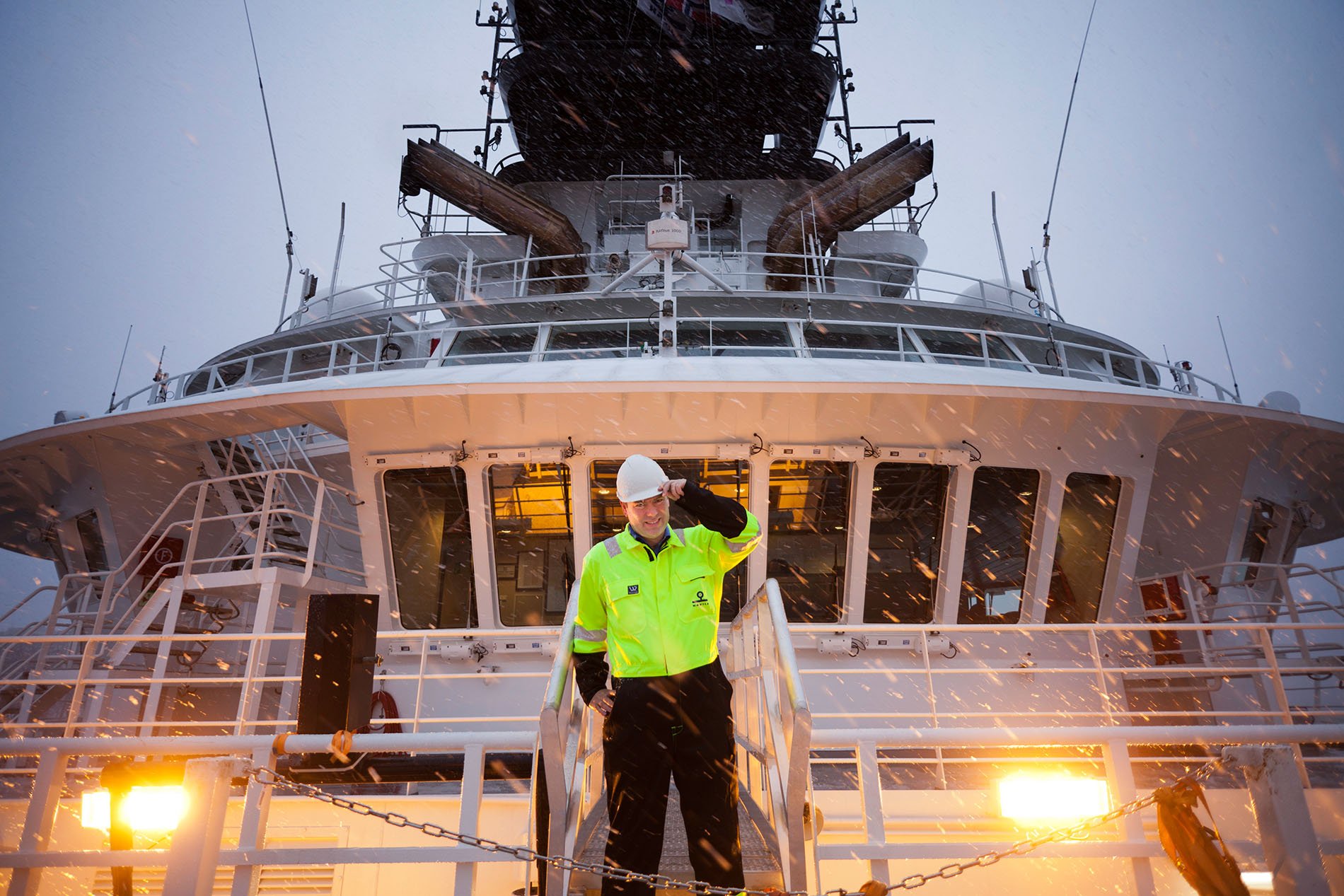 Man wearing Havila gear standing on a vessel Man wearing Havila gear standing on a vessel